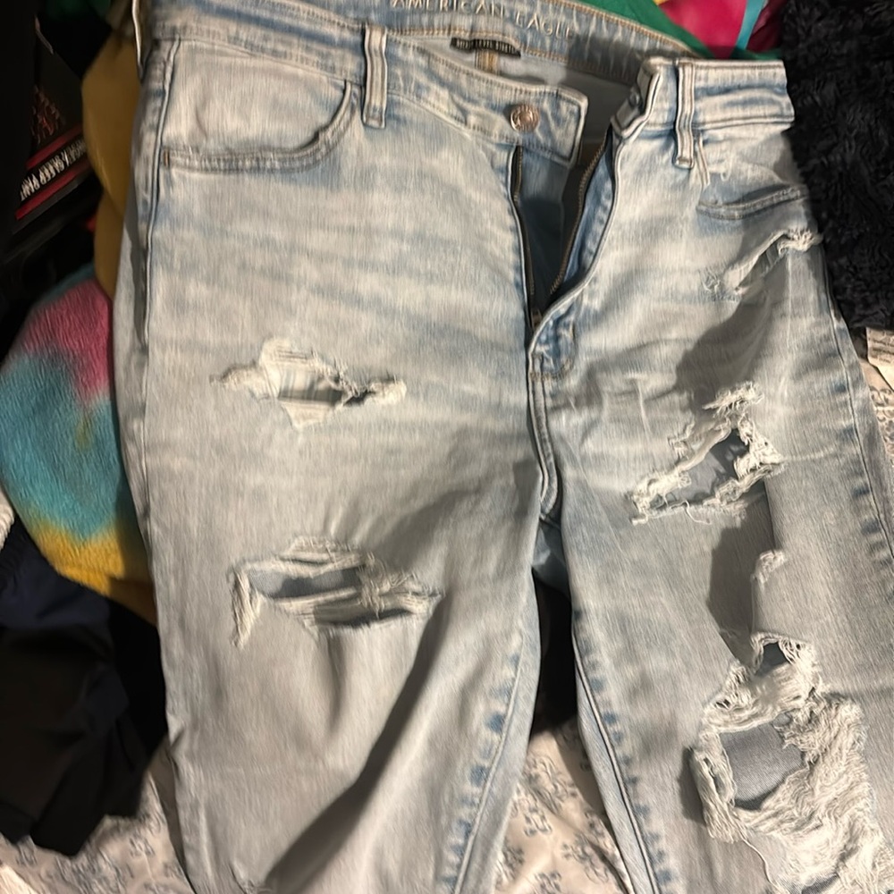 AE next level stretch 14s jeans w rips